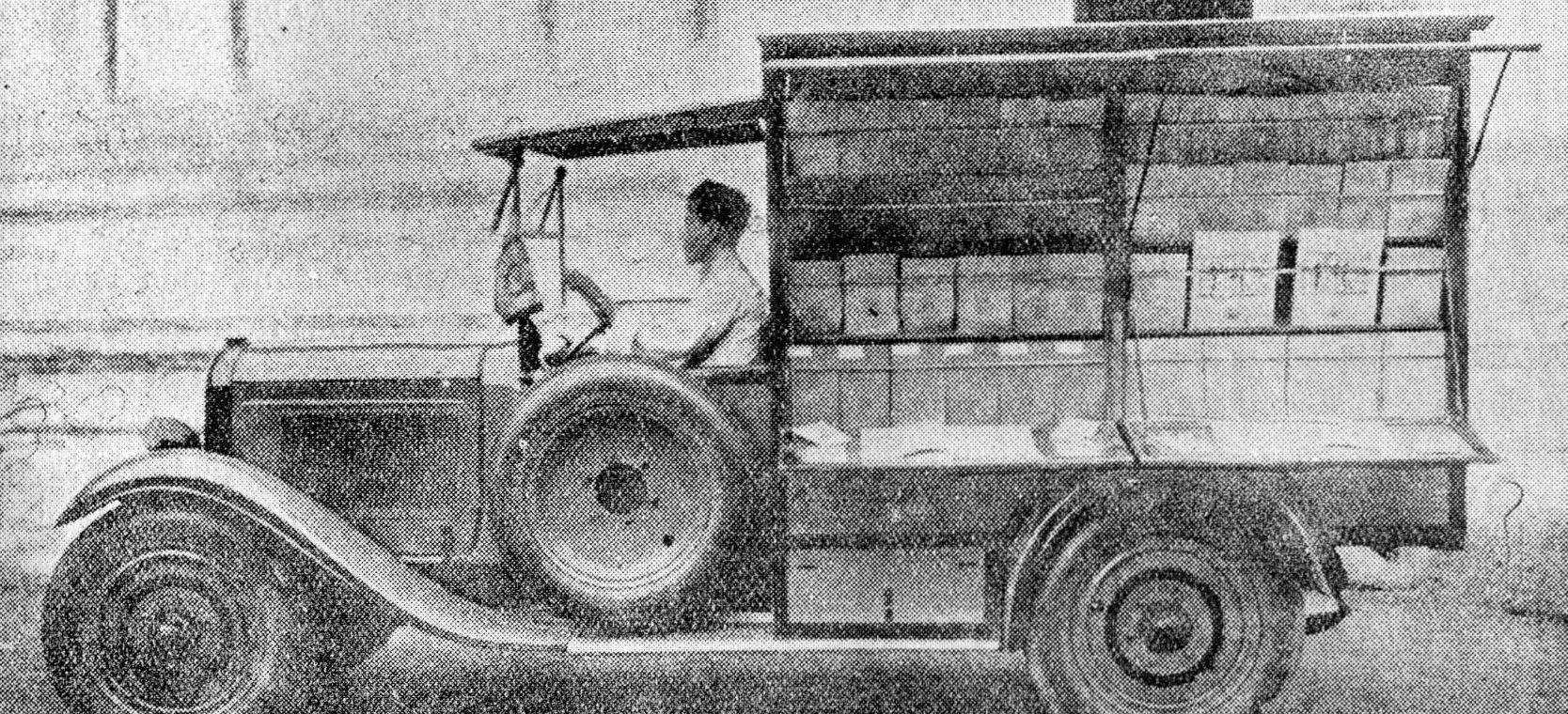 The Institut bouddhique's rolling library, a truck racked with manuscript bundles, Phnom Penh, 1930